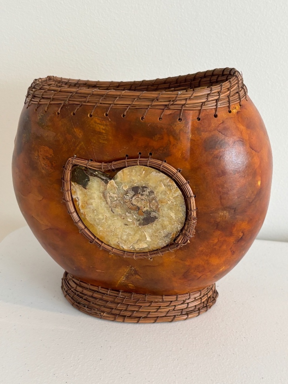 Handcrafted decorative gourd vessel with ammonite fossil inlay pine needle rims